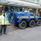 Illustration for article titled Vigilante Hippie Six-Wheeled Riot Tank Tries To Battle G20 Summit Protesters